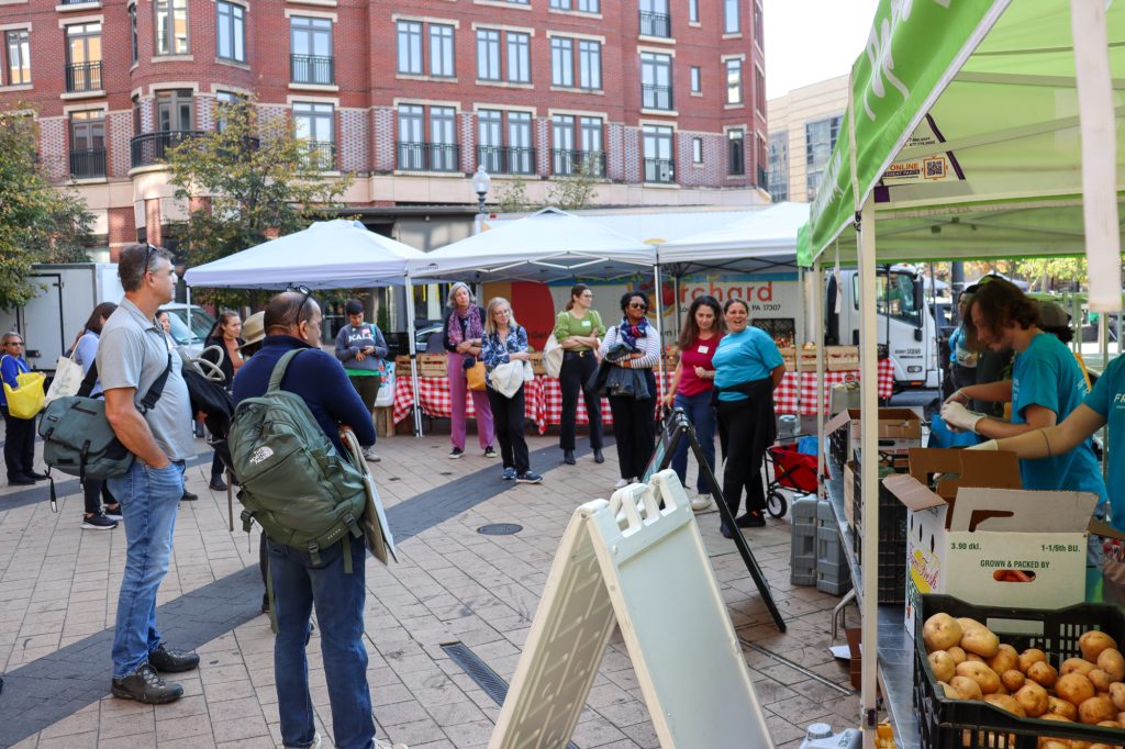 FRESHFARM supporters visit the Pop-Up Food Hub at the Columbia Heights Wednesday market